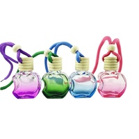 Échantillon gratuit de bouteille de parfum de voiture en verre transparent en forme de pomme corde personnalisée bouteille de désodorisant de voiture de parfum suspendu vide