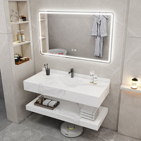 Meuble-lavabo de salle de bain double couche en marbre de luxe minimaliste avec vasque en pierre frittée et miroir intelligent pour hôtel