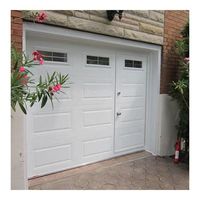 Porte de garage en acier roulante pour villa moderne sécurisée avec panneaux renforcés de polymère antivol, surface finie pour une protection durable