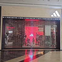 Volet roulant de sécurité en polycarbonate durable à vision extra large avec tige traversante pour porte, rideau de devanture de magasin, fourniture directe du fabricant