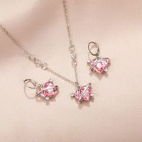Parures de bijoux tendance : collier, boucles d'oreilles, bague et pendentif – Cadeau idéal pour les couples (confessions/anniversaires)