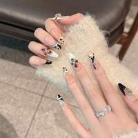 Faux ongles à presser faits main en amande, 10 pièces, ABS, rose nude brillant, motif léopard avec strass, ongles français noirs