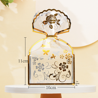 Boîte-cadeau de bonbon hexagonale imprimée d'or créative avec la conception mignonne de fleur Acétate clair PET vitrine pliante pour l'emballage