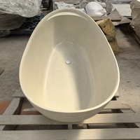 Baignoire en pierre artificielle texturée en terre cuite, surface solide mate, forme d'œuf, pour hôtel de luxe, villa, salle de bain