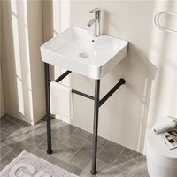 Lavabos de salle de bain simples à utiliser dans les hôtels modernes Lavabo à main en céramique avec support au sol Porte-serviettes