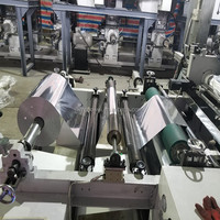 Machine à plastifier pour papier à cigarettes