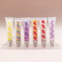 Tube en spirale multicolore en gros d'usine clair liquide hydratant imperméable à l'eau longue durée brillant à lèvres chatoyant parfumé aux fruits