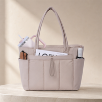 Sac fourre-tout en polyester matelassé avec porte-gobelet, compartiment pour ordinateur portable et pochette pour trolley, idéal pour les voyages, le travail, les infirmières et les femmes.