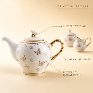 Ensemble de 3 pièces en porcelaine motif papillon : Théière, Pichet à lait, Sucrier à couvercle avec accents dorés – Vaisselle décorative pour la maison et idéale pour offrir - Product Image 2