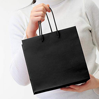 Sacs en papier à provisions en carton noir de luxe avec poignée en ruban Impression de logo personnalisée pour vêtements chaussures Promotion de supermarché
