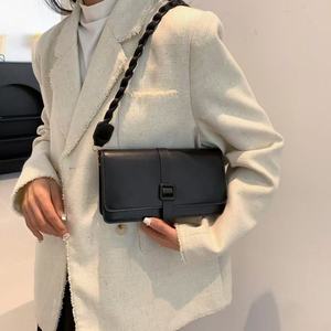 กระเป๋าสะพายคาดลำตัวทอพร้อมกระดุม - Product Image 5