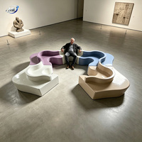 Ensemble de bancs modulaires en FRP à blocs de couleur, en forme de puzzle, pour l'extérieur