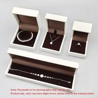 Boîte à bijoux en cuir PU blanc crème avec texture quadrillée et doublure en velours pour bagues, pendentifs, bracelets, colliers – Vente en gros