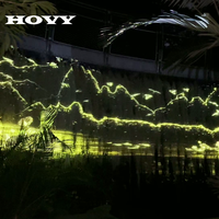 Projecteur de sol interactif à ondulations d'eau dynamiques HOVY, adapté à une utilisation en extérieur dans les parcs
