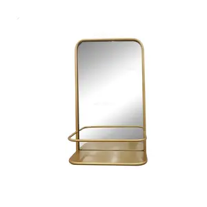 Specchio dorato decorativo da parete in metallo decorativo per la casa con ripiano