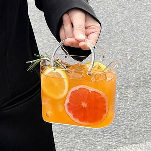 Verre à cocktail transparent créatif et amusant, design <span class=keywords><strong>sac</strong></span> à <span class=keywords><strong>main</strong></span>, très tendance, pour thé aux fruits d'été, avec un design ludique et un aspect élégant - Product Image 1