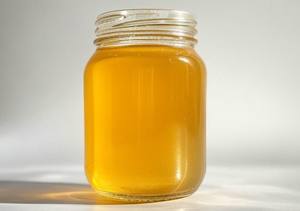 Miel de girofle biologique à texture lisse dorée, arôme riche fraîchement cueilli, naturel pur pour l'exportation, vente en gros, emballage de bouteilles au détail - Product Image 3