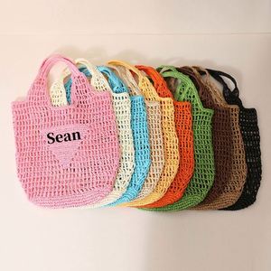 Bolso de mano de un solo hombro de ganchillo con logotipo personalizado, de paja de papel, en colores dulces, portátil, para playa, para mujer - Product Image 1