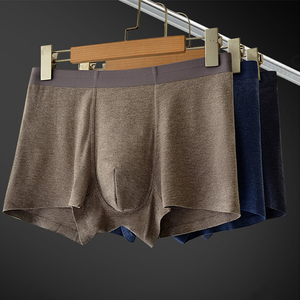 กางเกงบ็อกเซอร์ชายแบบถัก ระบายอากาศได้ดี ไร้ตะเข็บ สีพื้น ไม่ระบายกลิ่น เป็นมิตรต่อสิ่งแวดล้อม ขายส่ง - Product Image 1