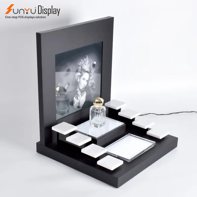 Atacado de alta qualidade preto luxo cosméticos acrílico display stand óleo essencial perfume maquiagem display com luz led