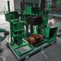 Nouvelle machine manuelle de fabrication de briques emboîtables et de blocs creux avec moteur et pression hydraulique