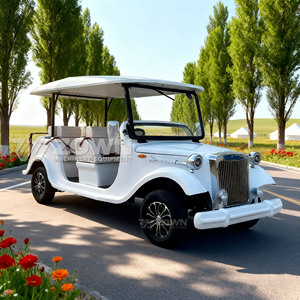 Voiturette de golf électrique classique blanche avec toit ouvert et design vintage pour utilisation en parc - Product Image 4