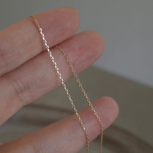 Collana FY-N021 alla Moda per Donna, Catena Invisibile in Argento 925 Placcato Oro 14K, Versatile ed Elegante con Ciondolo Sottile - Product Image 1