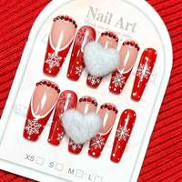 Prensa de Navidad en las uñas 10PCs Set Rojo Blanco Estilo francés Diseño de perlas Forma de ataúd de almendra larga Uñas postizas Colección al por mayor
