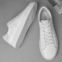 Nouvelles baskets en cuir véritable pour hommes, style minimaliste noir et blanc, chaussures décontractées basses, confortables pour la marche, idéales pour le bureau et le quotidien