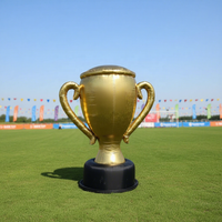 Trophée gonflable personnalisé en forme de coupe dorée pour la publicité de tournois sportifs, de cérémonies de remise de prix ou d'événements de championnat de marque