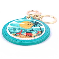 Porte-clés rond en cuir personnalisé de haute qualité, sac à dos avec pendentif brodé, cadeaux d'affaires