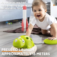 MILI Ensemble de jouets de sport d'extérieur 3-en-1 Dinosaure : Lanceur de fusées télécommandé, jeu de lancer d'anneaux et corde à sauter avec musique pour enfants