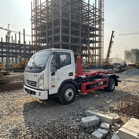 Camion compacteur de déchets à bras hydraulique détachable SAIC Yuejin Yellow Card pour garage souterrain, Euro 3 Diesel