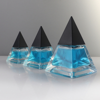 Einzigartige FEA13 Crimp 30ml 50ml 100ml Pyramidenförmige leere Parfümflasche Glas-Sprühflaschen Individuelle Verpackungen