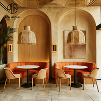 Ensemble de canapés et de tables de restaurant modernes en bois et marbre courbé pour café