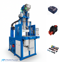 Machine de moulage par injection verticale pour connecteurs automobiles étanches avec serrage stable