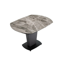 Vente à chaud ensemble de salle à manger de style moderne table rectangulaire extensible rotative avec siège en cuir pieds en fer trempé nouveau design