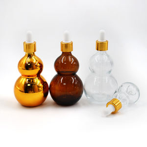 Bouteilles en verre compte-gouttes transparentes ambrées brillantes en forme de cantaloup de 15 ml, 20 ml, 30 ml, 50 ml pour huiles essentielles - Product Image 5