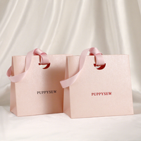 Sacs en papier cadeau écologiques de luxe avec logo personnalisé, fabriqués en usine, texture unique, avec poignée en ruban, pour emballages de bijoux