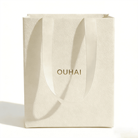 Sac d'emballage cadeau haut de gamme, personnalisation à guichet unique, sac de transport de luxe pour les achats, sac de vente au détail vert, vente en gros d'usine