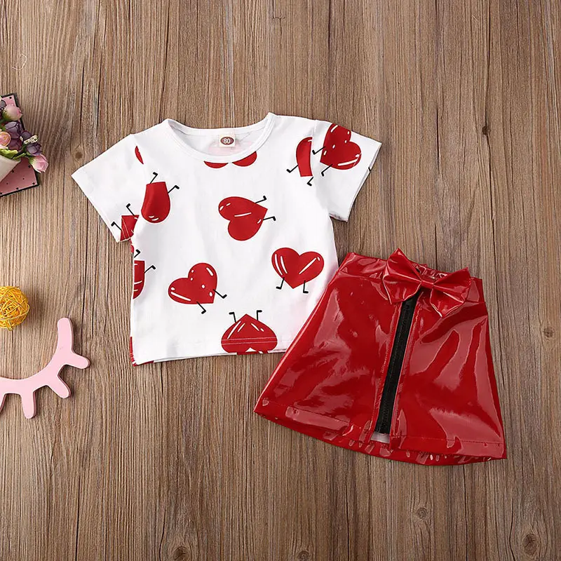 Ropa Infantil para niña pequeña, conjuntos de ropa de los días de San Valentín, camisetas con estampado de amor, Top, falda de cuero, traje de verano 1-5 años