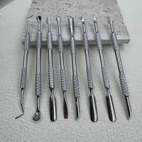 Outil multifonctionnel à double tête pour le nail art, en acier inoxydable, pour enlever les peaux mortes, repousser les cuticules, enlever le vernis à ongles en gel