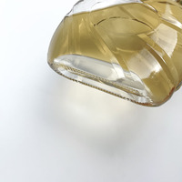 Bouteille en verre clair Brandy classique avec des lignes gravées