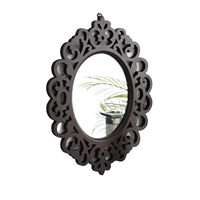 Miroir mural décoratif contemporain personnalisé, orné, unique, écologique, en filigrane sculpté, avec cadre ovale en bois foncé, pour salon