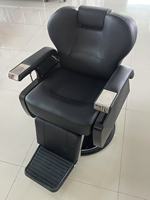 Fauteuil de barbier noir de luxe avec pompe à liquide, mobilier de salon de coiffure pour homme