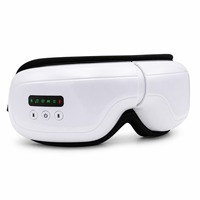 Masque de massage oculaire chauffant JY008 en gros avec pression d'air, vibration et musique, appareil de soin des yeux Type C OEM