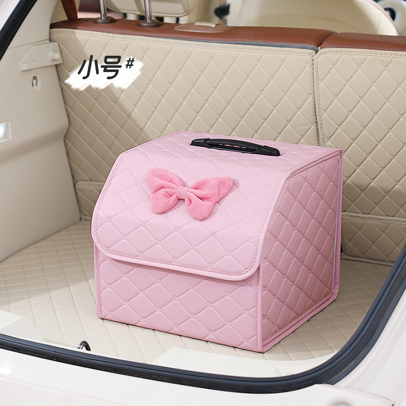 Petite boîte de rangement pliante avec autocollants roses et un nœud en velours rose