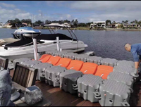 Plateforme flottante modulaire en plastique PE, ponton flottant pour le stationnement et l'amarrage de jet-skis et de bateaux