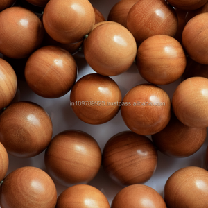 Venta al por mayor Riddhi Siddhi Cuentas de sándalo de 12mm-Ecológico Fragancia amaderada dulce Natural Marrón dorado oscuro Cuentas DEL SUR DE LA India - Product Image 1
