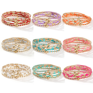 Conjunto navideño de cinco piezas, pulseras de cuentas de semillas de oro, pulseras de hilo con cuentas, joyería, regalo de Navidad, pulseras elásticas apilables - Product Image 4